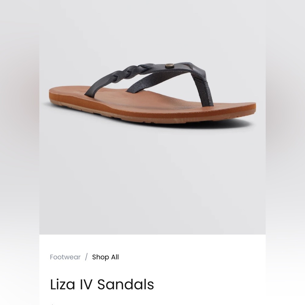 New with tags. Never worn. Roxy flip flops with leather strap 🖤